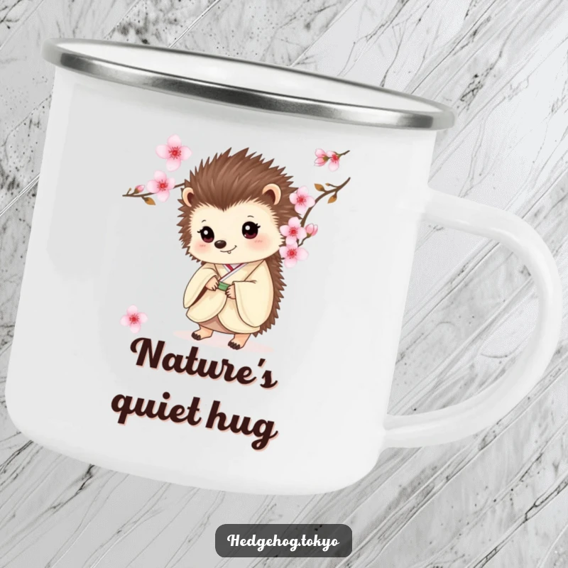 Funny camping mug with a hedgehog in a kimono, peeking from behind cherry blossoms, perfect for outdoor adventures.