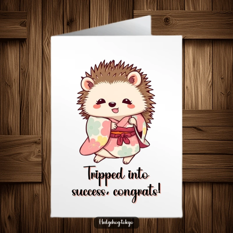 Funny Free Printable Congratulations Card: A hedgehog in a colorful kimono playfully trips and stumbles over its own outfit.