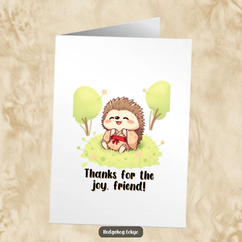 Funny free printable thank you card featuring a happy hedgehog in a kimono rolling in moss.