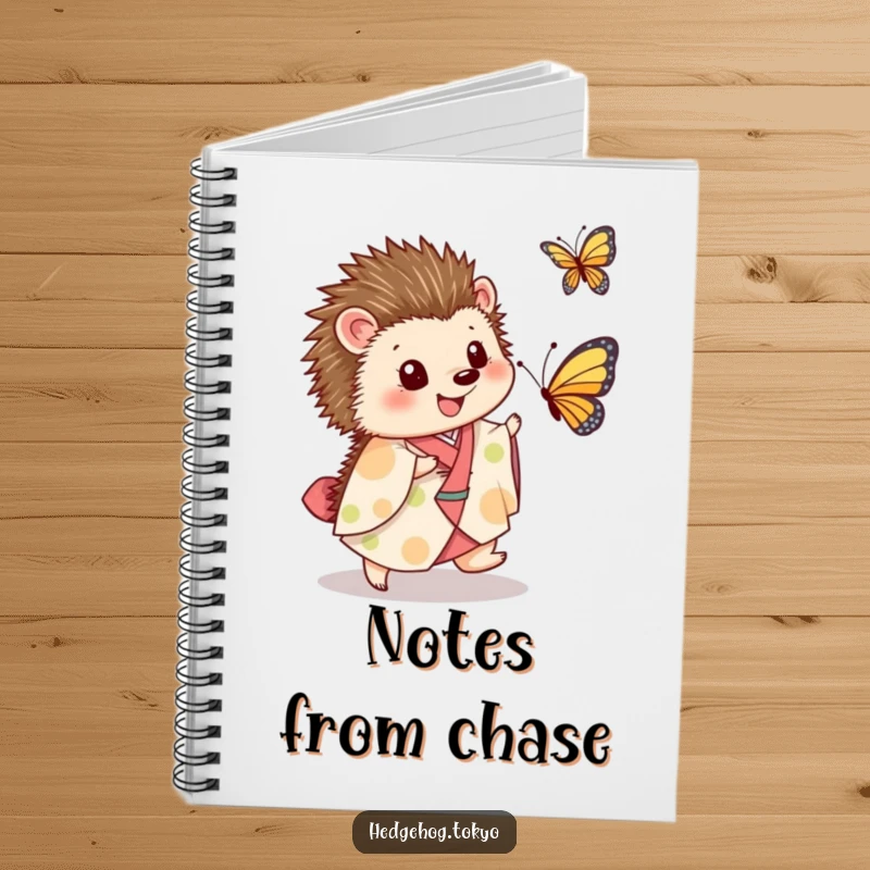 Funny Notebook: A joyful hedgehog in a kimono is depicted chasing a butterfly, symbolizing playful pursuits and happy thoughts for your notes.